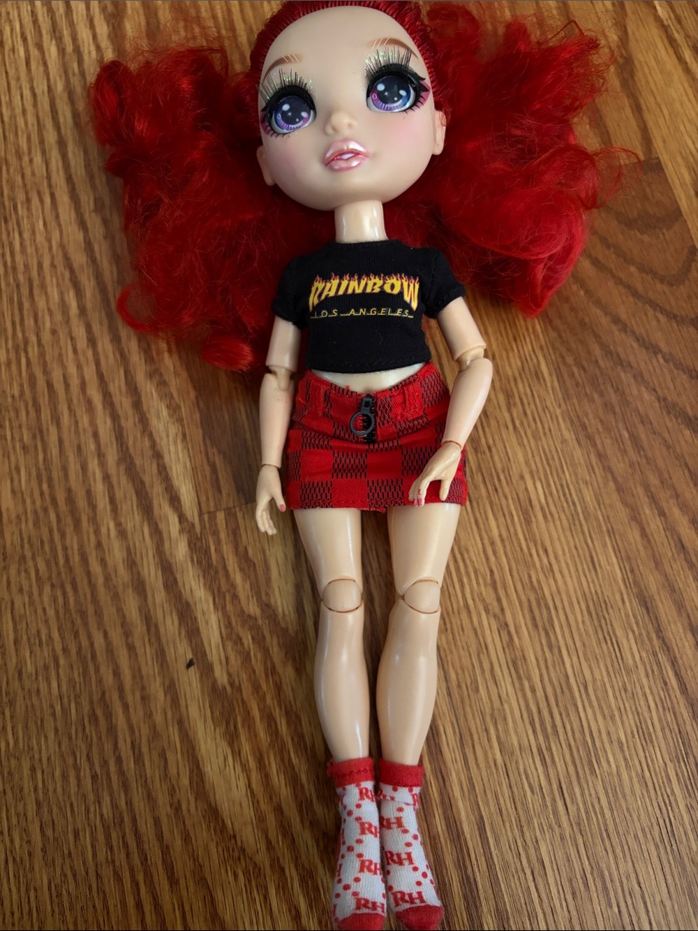 Red-Haired Fashion Doll with Plaid Skirt